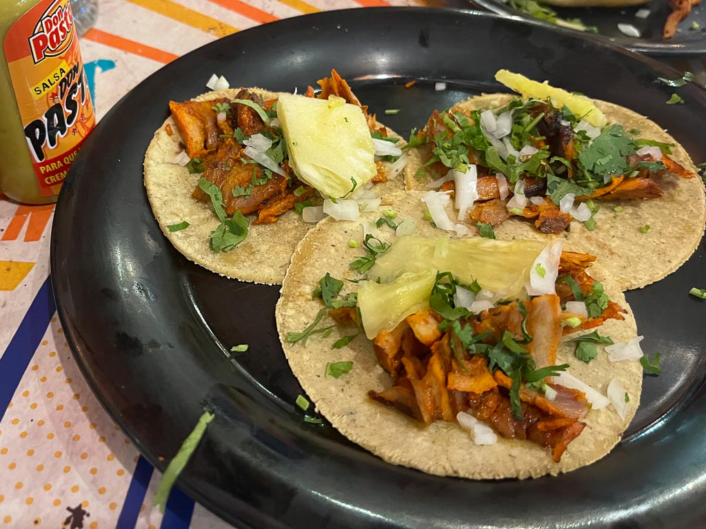 Tacos with meat, onions and parsley